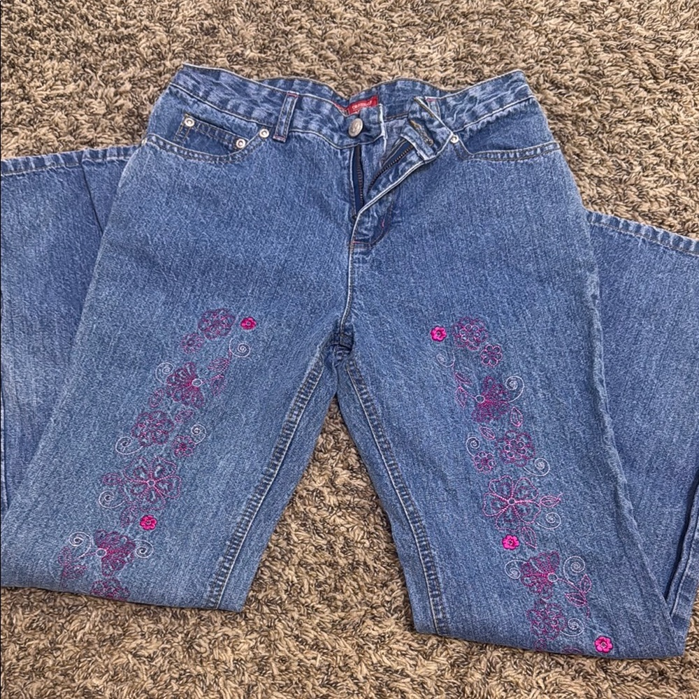 girls size 14 blue denim jeans; with pink embroidery and pink floral embroidery